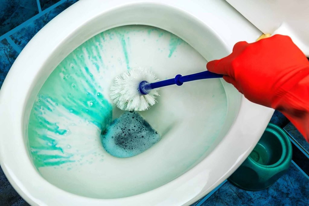 cleaning toilet